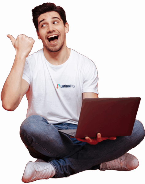 a man sitting on the floor holding a laptop copy