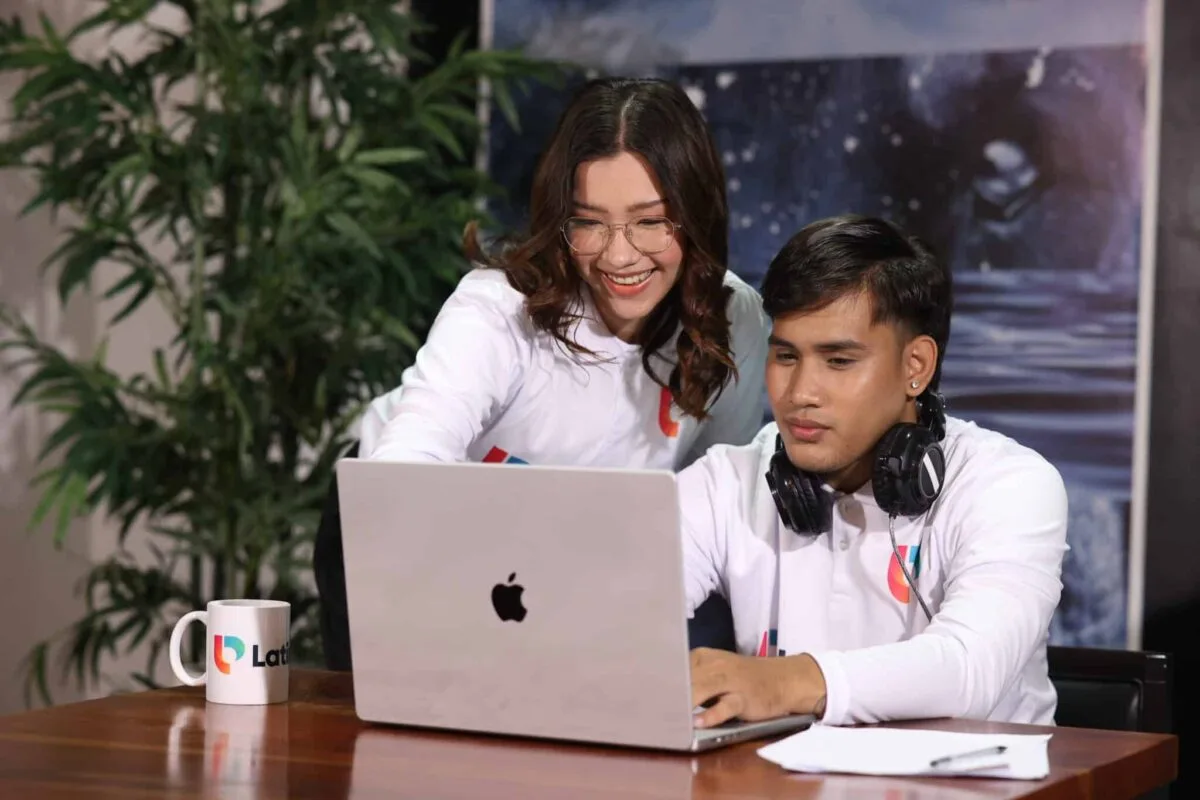 a LatinoPro virtual assistant helping a colleague