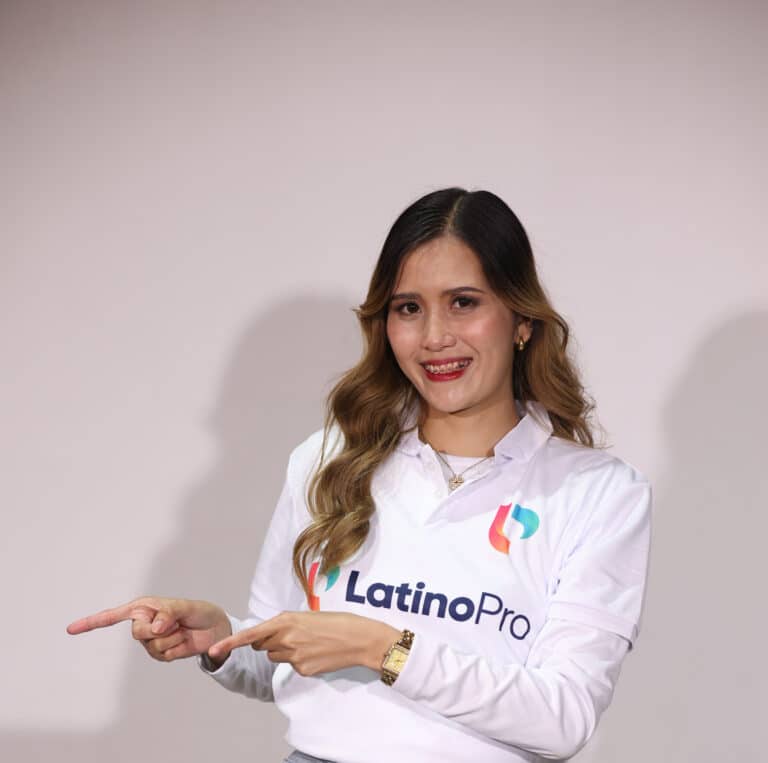 Smiling woman pointing, illustrating the differences in appointm