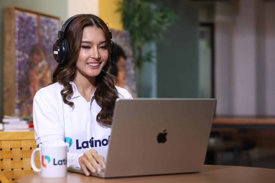 customer service representative virtual assistant, working with a laptop and a headphone