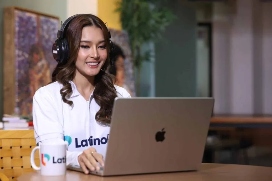 customer service representative virtual assistant, working with a laptop and a headphone